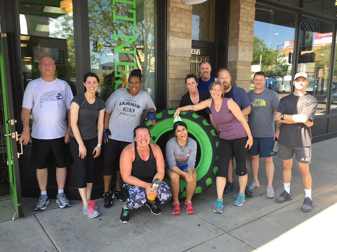 class participants in front of Green Door Fitness